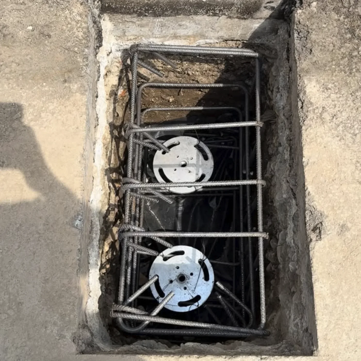 MARTETIC foundation screws in an area with existing foundations and utilities