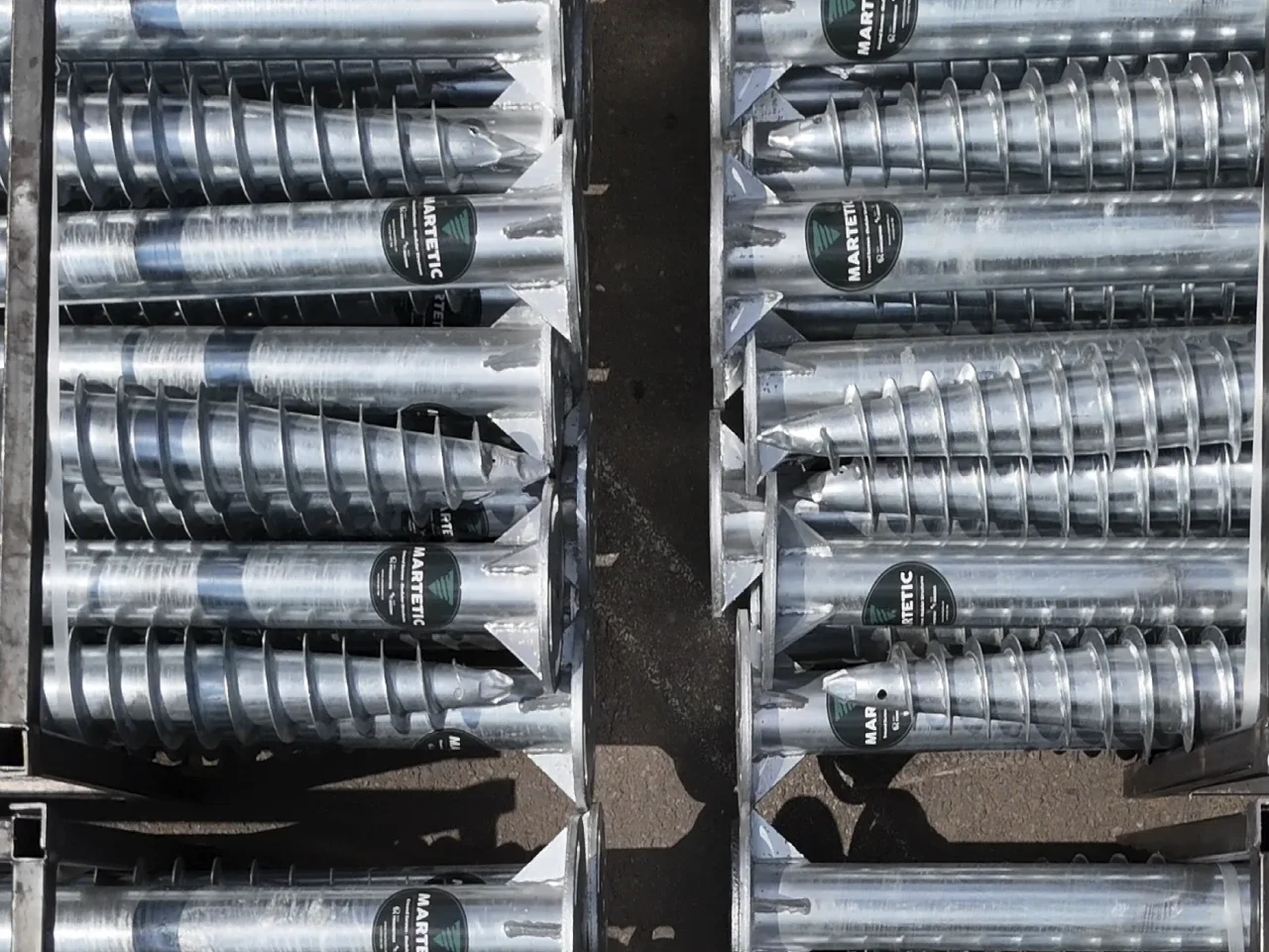MARTETIC galvanised foundation screws, with the thread, tip and flange visible